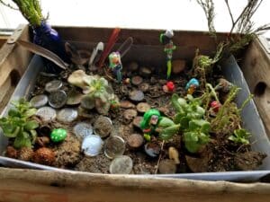 Fairy garden with succulents and polymer clay pieces