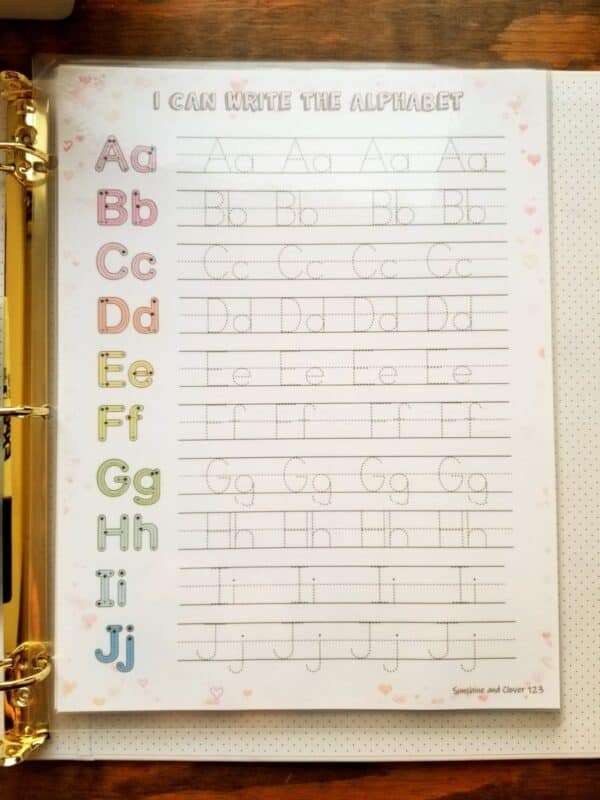 alphabet tracing worksheet with hearts and rainbow theme