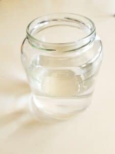 water density experiment showing a large container filled with cold water