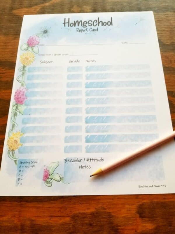 printable homeschooler report card with spring flower dandelions and clover artwork.