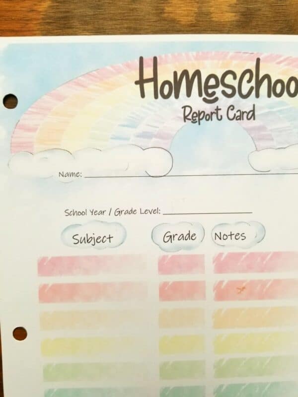 Rainbow themed homeschool report card. Includes hand illustrated rainbow at the top with rainbow colored blocks throughout. Includes sections for name, school year, date, subjects, grades, notes, grading scale and behavior notes.