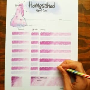 Printable homeschool grade card in pink and purple science theme.