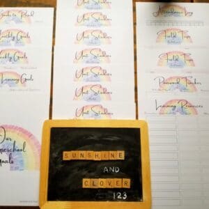 Printable homeschool planner includes 17 pages in hand illustrated rainbow design. Made by Sunshine and Clover 123.