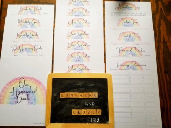 Printable homeschool planner includes 17 pages in hand illustrated rainbow design. Made by Sunshine and Clover 123.