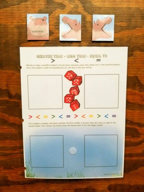 Kindergarten math worksheet for practicing greater than, less than and equal to. Hippos represent the arrows and equal sign and there is space to write in numbers for comparing.