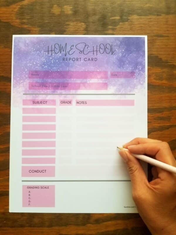 printable homeschool report card with outerspace galaxy theme. Pink accents squares included.