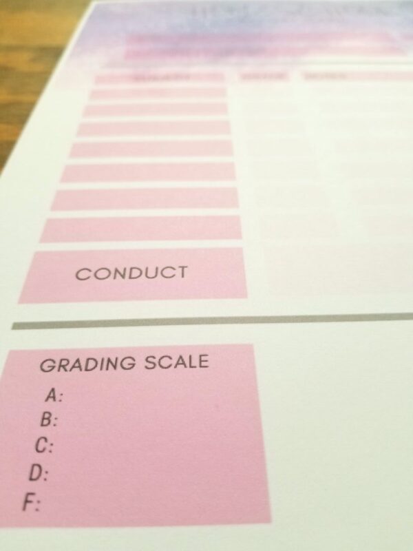 Galaxy themed homeschool report card with pink accenting throughout. There is an area to write in your grading scale.