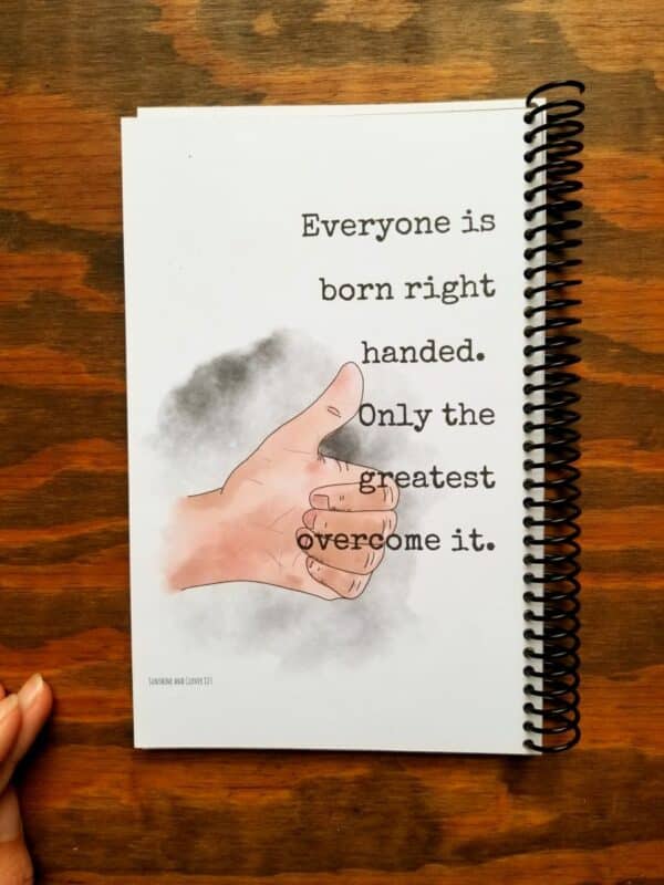 funny left handed notebook contains a hand illustrated thumbs up picture as well as a funny saying. Spiral bound notebook contains spiral binding on the opposite side of usual as a funny gag for lefties.