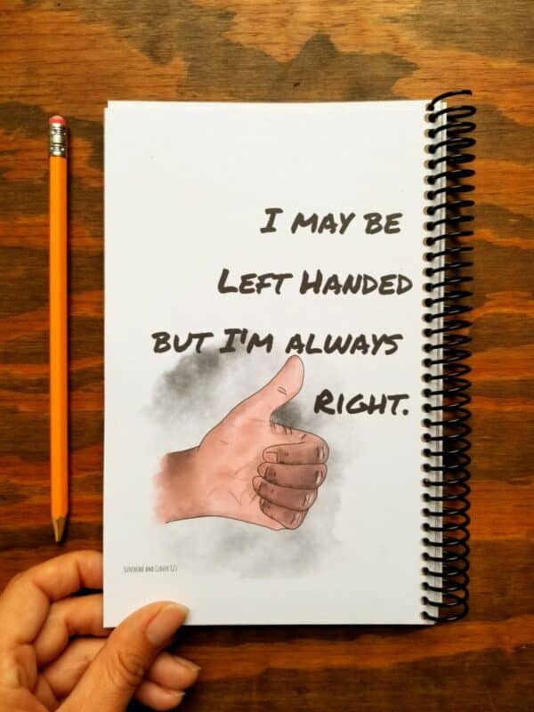 Left handed notebook makes a funny gift for left handers and includes spiral binding on the opposite side from usual. Sketchbook includes a hand illustrated thumbs up hand that comes in light and dark skin tones.