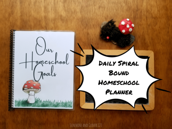 Daily spiral bound homeschool planner come sin hand illustrated red mushroom theme.