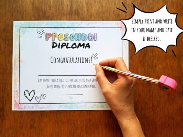 Printable diploma has rainbow coloring around the edges and a rainbow colored font at the top for each grade. there is room to write in your child's name and date.