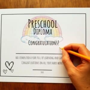 printable and editable diploma in a rainbow with clouds design. Certificate completion is shown with preschool but includes files for up to 11th grade.