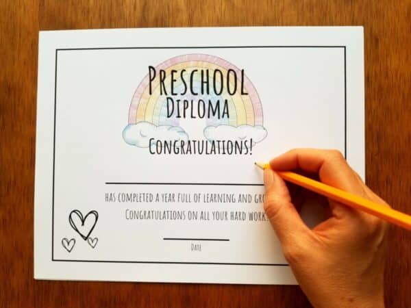 printable and editable diploma in a rainbow with clouds design. Certificate completion is shown with preschool but includes files for up to 11th grade.