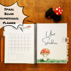 Spiral bound homeschool planner includes unit studies section and monthly calendars that are undated. the whole planner comes in a hand illustrated red mushroom theme.