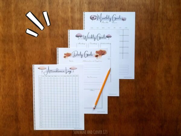 Printable homeschool planner includes an attendance log, daily goals, weekly goals, and monthly goals planning pages. All pages have a mushroom theme and soft brown accenting.