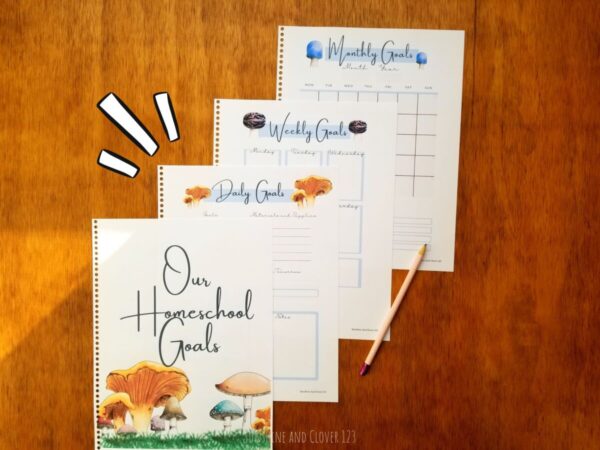 Homeschool planner includes daily, weekly and monthly planning pages, as well as a cover that is titled "Our Homeschool Goals". All pages include hand illustrated mushrooms.