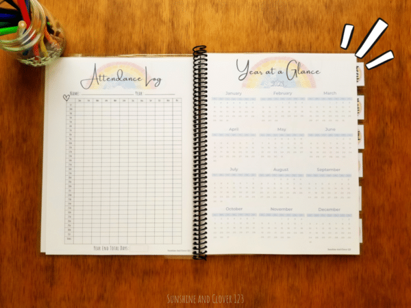 Homeschool planner comes with an attendance log and year at a glance pages. All pages in the planner have a rainbow theme to them.