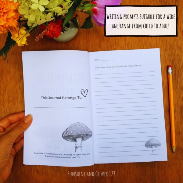 Mindfulness journal includes gratitude writing prompts suitable for a wide range of ages from child to adult. A "This journal belongs to:" section is included in the front of the journal. Pages are black and white with mushrooms throughout.