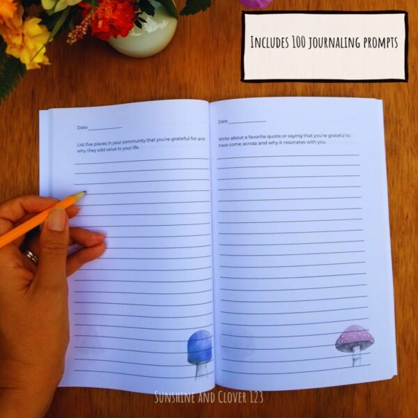 Gratitude journaling prompts includes 100 journaling prompts that encourage a thankful mind. Pages include colorful mushrooms on the bottom of each page and a new prompt at the top with lines below that fill up the rest of the page.