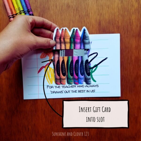 Printable gift card holder for teacher appreciation in colorful crayon theme shows how the gift card goes into the slot with the crayon topper taped onto gift card in order to hide it within the card.