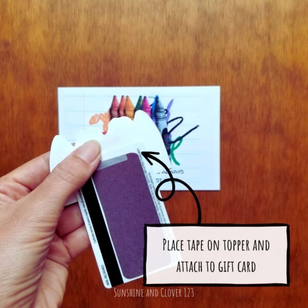 Printable gift card holder showing how to tape your gift card to the card topper before placing in the gift card slot.