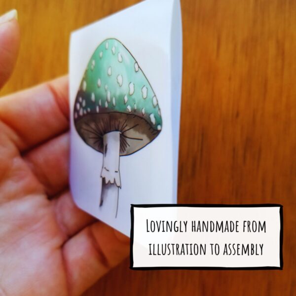 Cute magnetic bookmark is lovingly handmade from illustration to assembly and has a hand illustrated green mushroom on it.