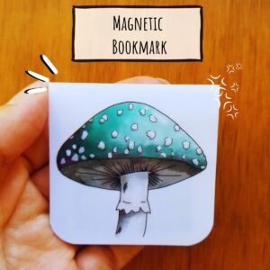 Magnetic bookmark for men or anyone really has hand illustrated mushroom. Mushroom is green with white spots on the mushroom cap.