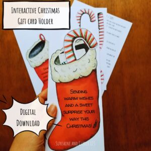 Christmas gift card holder is printable with a hand illustrated stocking and candy cane coming out the top.