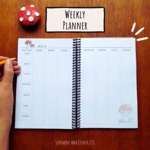 weekly planner has hand illustrated red mushroom designs along the pages.