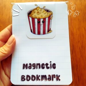 Magnetic bookmark with hand illustrated popcorn on front and back side.