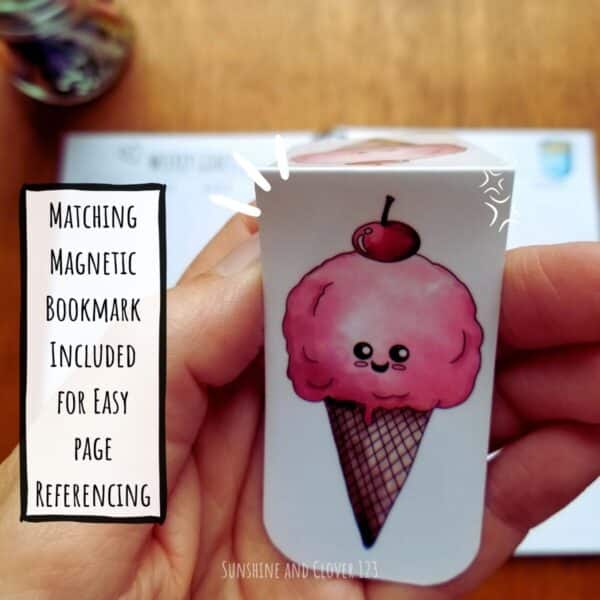 Kawaii style planner includes a matching themed bookmark of a little smiling ice cream cone. The bookmark is magnetic and can be used for easy page referencing.